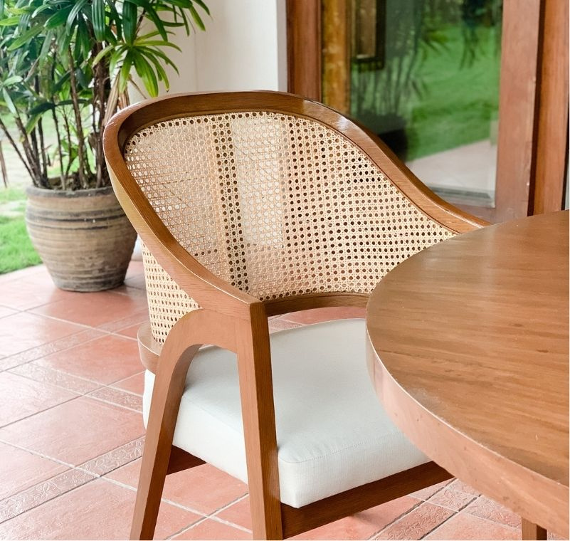 Handwoven rattan chair showcasing natural fiber craftsmanship for sustainable furniture design.